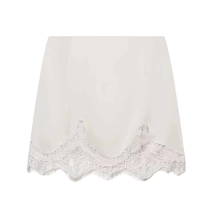 White mini skirt with asymmetric lace hem and eyelash lace detailing for women