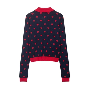 Navy blue knitted cardigan with red heart jacquard pattern and ribbed trim details