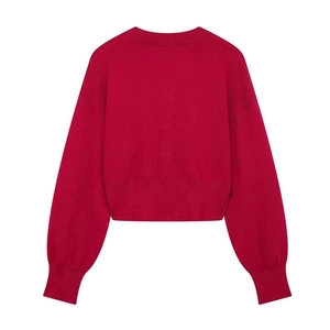 Back view of red long sleeve knit sweater with round neck and ribbed hem details