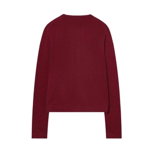 Detail view of burgundy knit cardigan back showing ribbed cuffs and premium textured weave