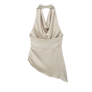 Asymmetric champagne satin halter top with cowl neck and glossy drapes on white back