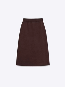 Detail of high-waisted dark coffee knitted skirt with thick texture and elastic waist