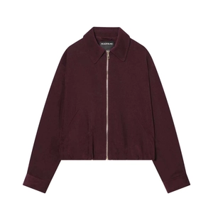 Detail of burgundy zip jacket with silver metal hardware and classic collar design