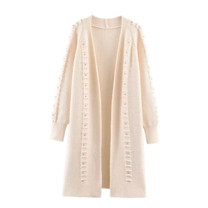 Elegant cream white knit cardigan with pearl bead embellishments along the sleeves