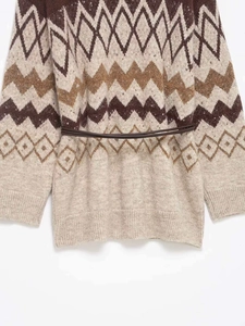 Detail of vintage geometric jacquard knit sweater with slim coffee brown leather belt