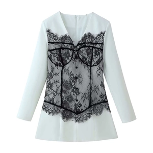 Elegant white blazer dress with black floral lace overlay and deep V-neckline
