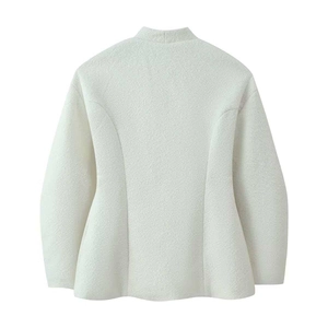 Back view of cream-white tweed jacket featuring stand collar and flared peplum hem design