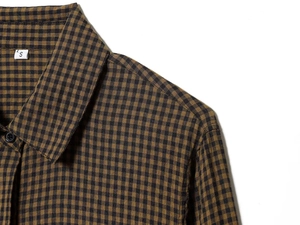 Close-up of the vintage brown gingham plaid shirt collar and stitching detail