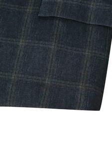 Close-up of premium plaid woven fabric in dark navy for vintage style blazers
