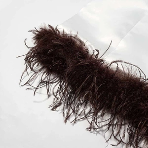 Satin mini dress with brown feather trim detailing on the hem for a luxury evening look