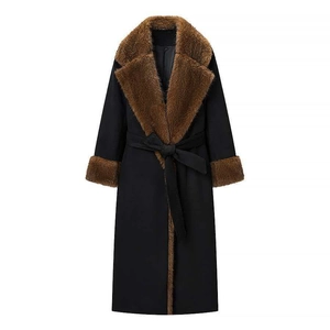 Chic black cinched wool coat with brown faux fur collar and matching waist belt