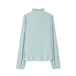 Detail of mint green blouse back featuring ruffled stand collar and loose silhouette