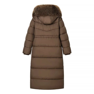 Macro view of the quilted back on a brown hooded winter parka with a soft faux fur collar