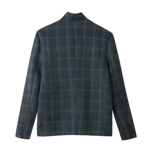 Detail view of the back of a vintage plaid blazer with standing collar and buttoned cuffs