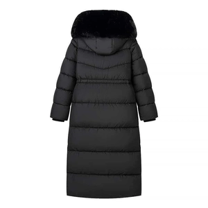 Detail view of winter long puffer coat back with fur hood and quilted waistline