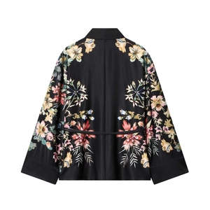 Floral print satin kimono robe with wide sleeves and colorful flower pattern on black fabric