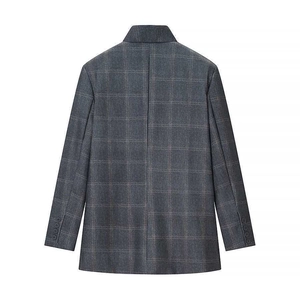 Detailed back view of dark grey plaid blazer featuring four buttons on the cuff