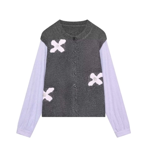 Gray knit cardigan with lavender sleeves, 3D floral accents, and pearl details