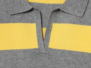 Close-up of polo collar and knit texture on grey and yellow striped long sleeve sweater