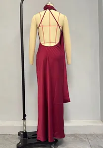 Detailed back view of burgundy halter maxi dress with crisscross tie-up open back design