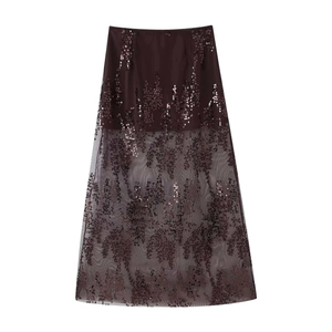 Detail of high-waisted sequin midi skirt with embroidered mesh hem in dark brown