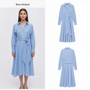 Detail view of a blue and white striped shirt dress with waist belt and button closure