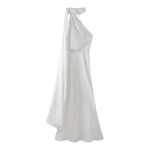 Detail of elegant backless halter neck white satin midi dress with flowing tie straps