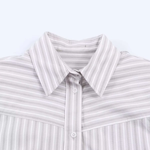 Close-up of vertical gray striped shirt collar, fabric texture and white resin buttons