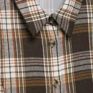 Classic brown plaid shirt with lapel collar and dark resin buttons detail view