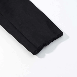 Macro view of the warm fleece lining and thick fabric texture on a winter jacket sleeve