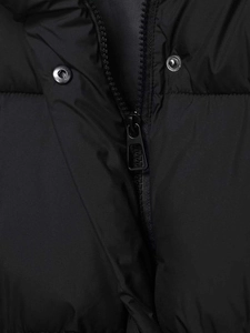 Detailed close-up of the black quilted jacket featuring a zipper and silver metal buttons