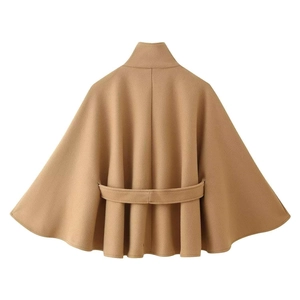 Detail of the back pleats and decorative belt on this camel wool-like cape coat