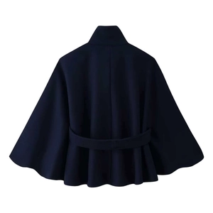 Back view of a dark blue cape coat featuring a high neck and waist belt detail