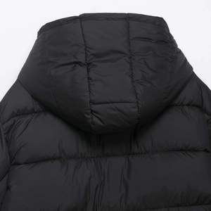 Women's black hooded puffer jacket with warm quilted padding and casual loose fit