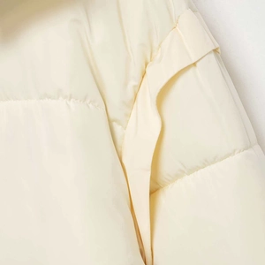 Fashionable off-white quilted hooded jacket with windproof stitching and padded texture