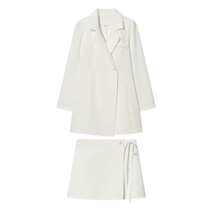 Minimalist white two-piece suit set featuring long sleeve blazer and wrap skirt with ties