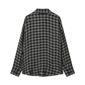 Rear view of a classic black and green plaid long-sleeve shirt in a loose straight fit