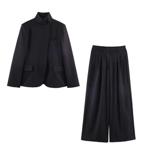 Minimalist black two-piece suit with stand collar jacket and wide-leg trousers for business