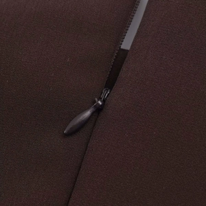 Detail of high-quality invisible zipper on dark brown solid short sleeve summer dress