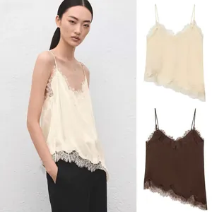 Detail of V-neck lace patchwork satin camisole top with delicate eyelash lace trim