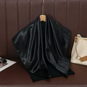 Glossy black satin square scarf 90cm on a wooden hanger with luxury fashion accessories