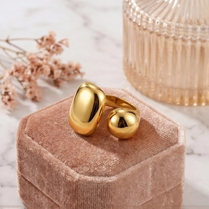 Polished 18K gold-plated stainless steel open ring with geometric sphere and pebble design