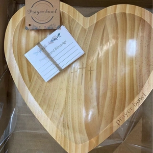 Handcrafted heart-shaped wooden prayer bowl with engraved crosses and blessing cards