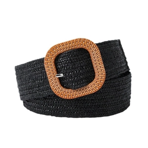 Women's black woven straw elastic belt with a large brown wood-grain square buckle