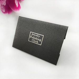 Detail of premium black textured pearl paper envelope for jewelry polishing cloth