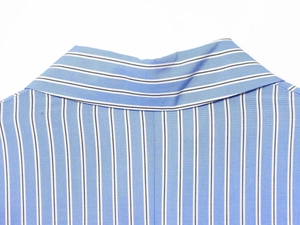 Close-up of contrast vertical and horizontal stripes on a cotton shirt dress collar