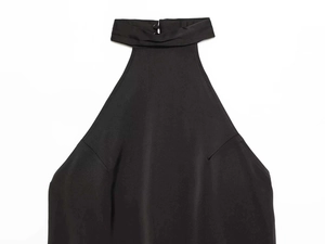 Detail of black halter neckline with stand collar and two back buttons on lace top