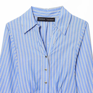 Vertical blue and white striped shirt dress with luxury gold metal buttons and lapel collar