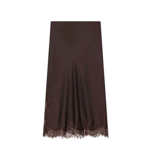Detail of dark coffee satin skirt with delicate lace trim and elegant silky texture