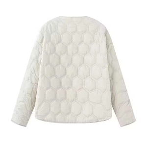 Beige hexagonal quilted lightweight jacket with a minimalist collarless back design